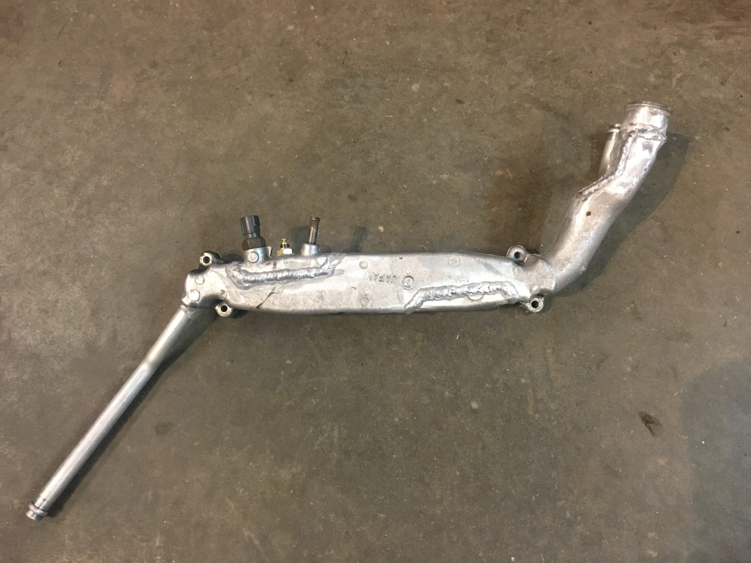 Reversed Coolant Manifold For Subaru Ej Series Engine Specialised Parts Reversed Coolant Manifold For Subaru Ej Series Engine Specialised Parts