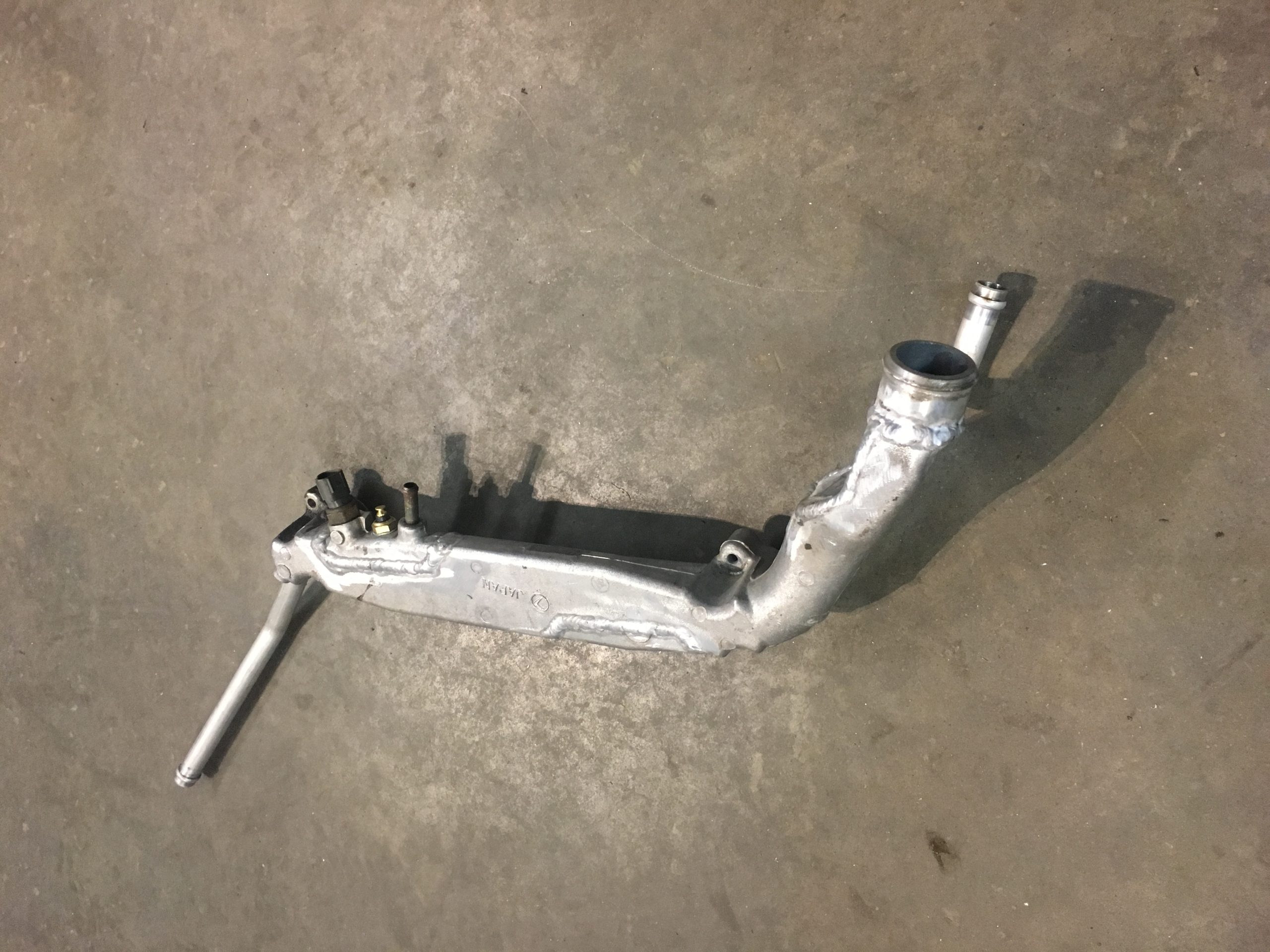 Reversed Coolant Manifold For Subaru Ej Series Engine Specialised Parts Reversed Coolant Manifold For Subaru Ej Series Engine Specialised Parts