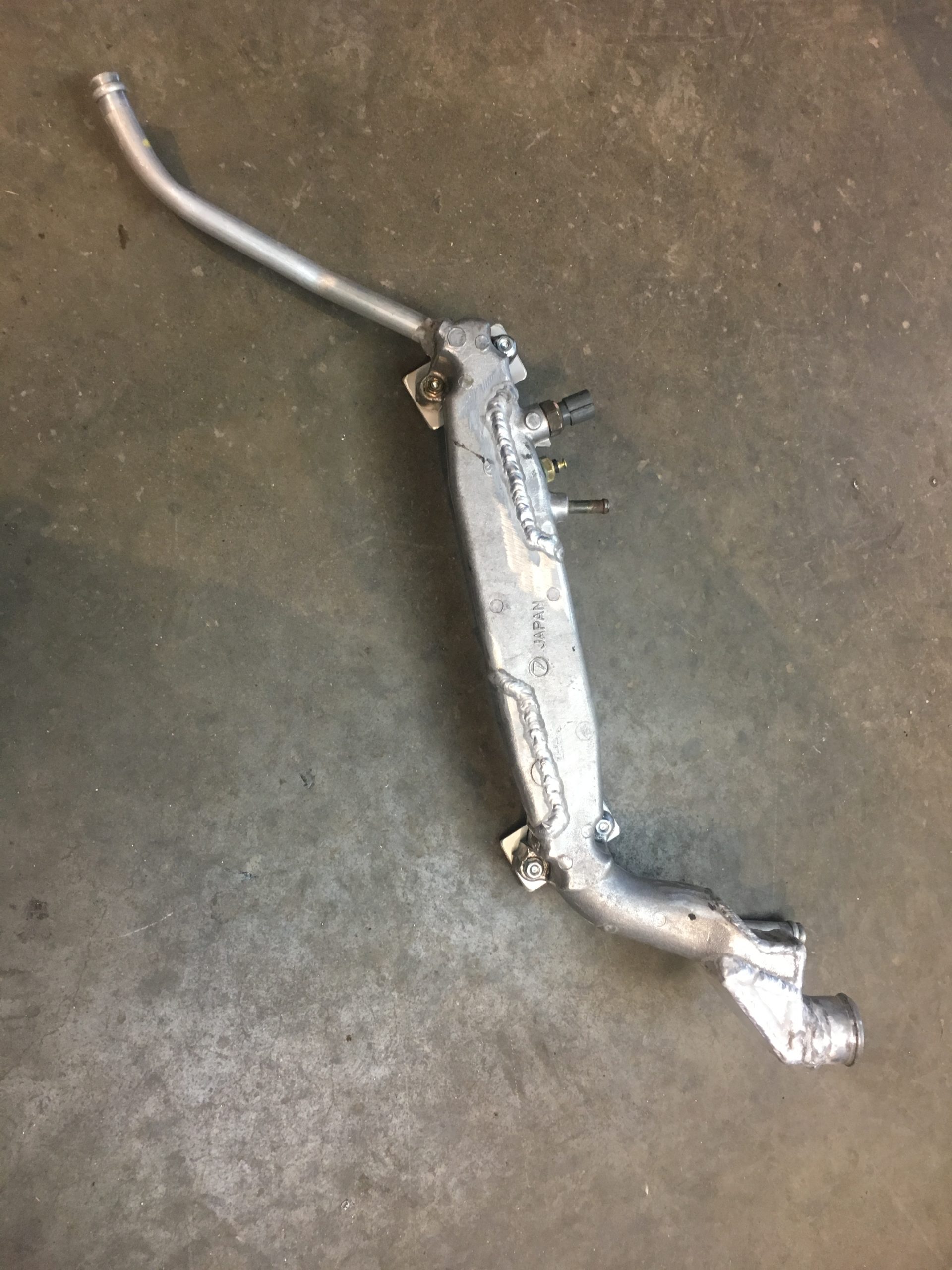 Reversed Coolant Manifold For Subaru Ej Series Engine Specialised Parts Reversed Coolant Manifold For Subaru Ej Series Engine Specialised Parts